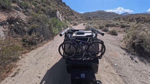 The teardrop camper trailer travels through Plum Canyon and Anza Borego Desert State Park, showcasing the off-road adventure and landscape.