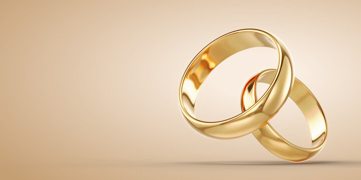 A pair of gold wedding rings on light background - 3d rendering