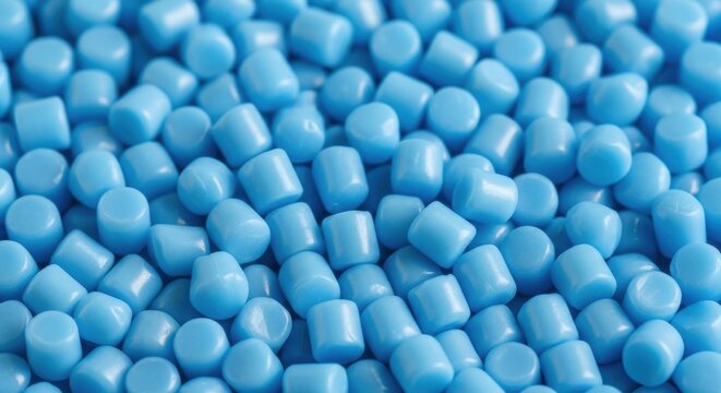Macro View of Light Blue Industrial Polymer Pellets and Plastic Granules