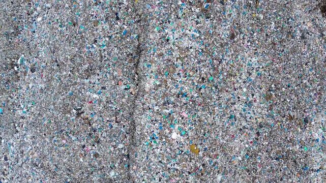 Chaotic garbage texture background with plastic waste pattern for abstract design aerial