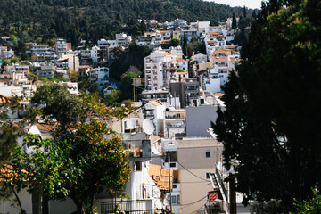 Fototapeta premium Rooftops Along a Street in Kavala Greece Urban Cityscape
