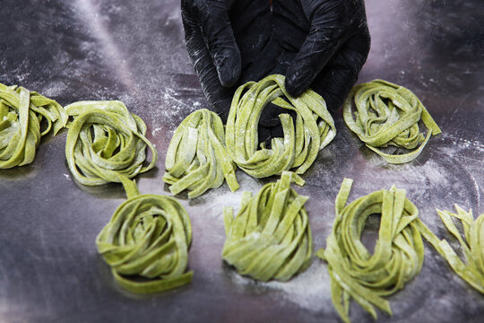 Homemade spinach pasta. Paste is green. Natural dye. Italian food. Top view