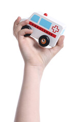 Child with toy car on white background, closeup © New Africa
