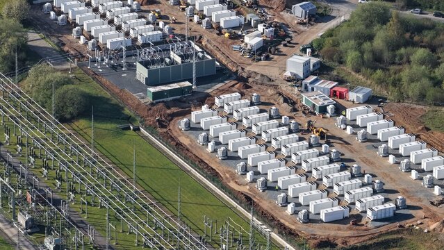 Aerial view of a large-scale battery storage construction site in Germany, highlighting the expansion of energy storage infrastructure as part of the renewable energy transition. 