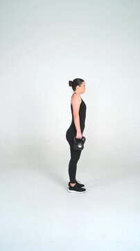 Kettlebell Shrug - Female Fitness Model Workout on White Background, Seamless Loop