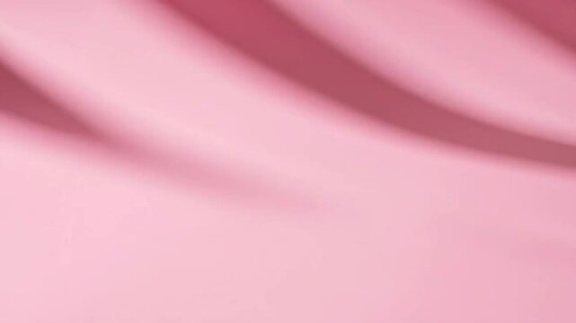 soft pink satin fabric folds with elegant drape and gentle lighting
