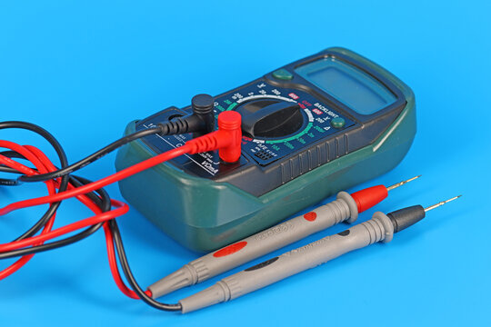 A digital multimeter for measuring the parameters of electrical circuits. Close-up. Soft focus.