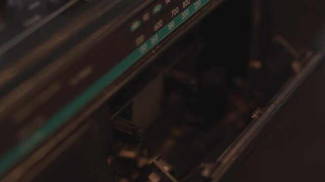 Closeup Of Cassette Mechanism With Reels. Interior View Of Tape Deck With Ambient Lighting And Indicators. Media