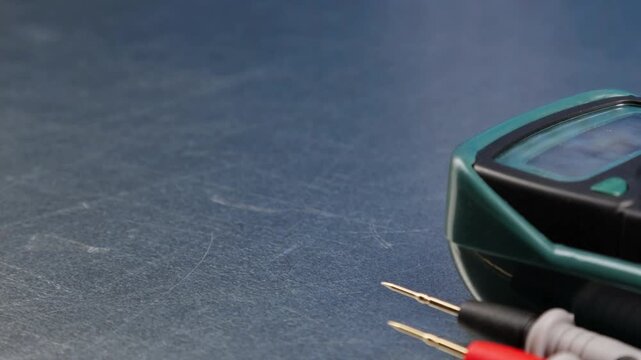 A digital multimeter for measuring the parameters of electrical circuits. Close-up. Soft focus.