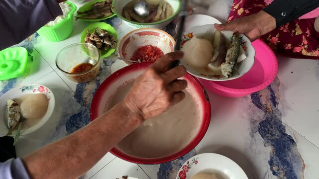 Papeda traditional staple food in Maluku Indonesia. Made from sago served with fish.