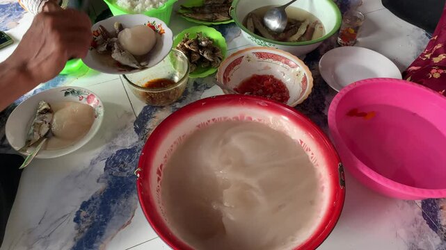 Papeda traditional staple food in Maluku Indonesia. Made from sago served with fish.