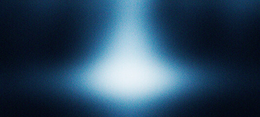 Fototapeta premium Abstract image capturing soft light beam on dark blue grainy surface creating ethereal and mysterious mood, ideal for conceptual designs and atmospheric visual projects.