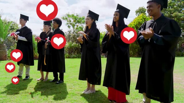 Graduates clapping for graduation after offstage diploma handoff, stepping back while hearts rising