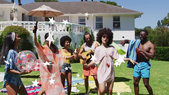 Guitarist playing triggers group on lawn dancing while phone filming for social white stars overlay
