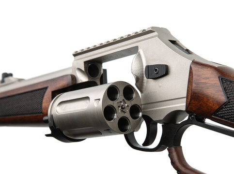 Close up of an open revolver rifle cylinder isolated on white back