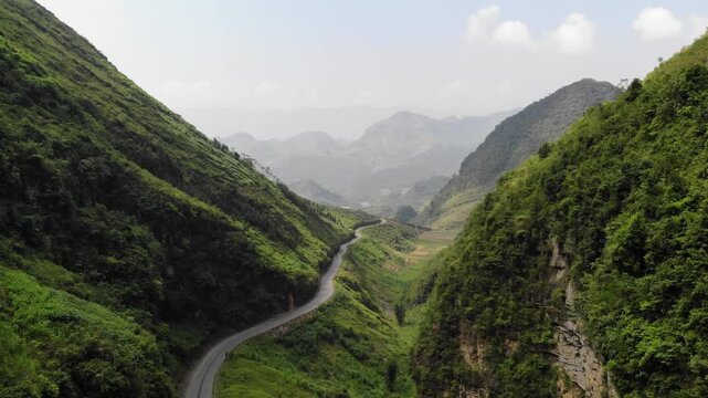 High Altitude Aerial Drone Over Winding Ha Giang Loop Road, Northern Vietnam