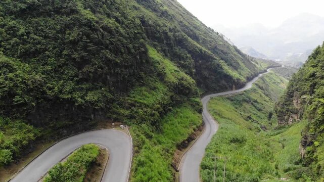High Altitude Aerial Drone Over Winding Ha Giang Loop Road, Northern Vietnam