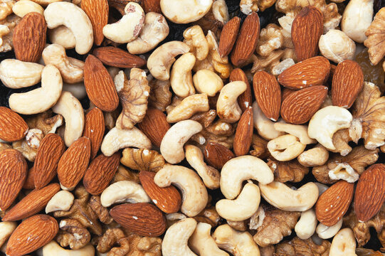Mix of nuts and dried fruits. Background and texture with a top view.