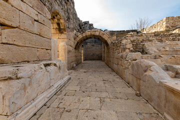 Fototapeta premium Cibyra or Kibyra, also referred to as Cibyra Magna, was an Ancient Greek city near the modern town of Gölhisar, in Burdur Province. Ruined antique theater panoramic view at archaeological site of anci