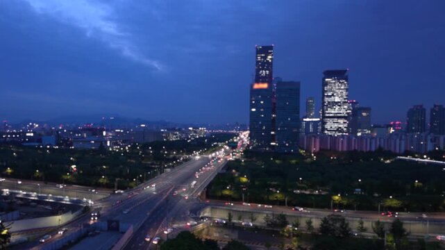 Seoul Cityscape at Blue Hour Before Sunrise with Skyscrapers and Early Morning Traffic