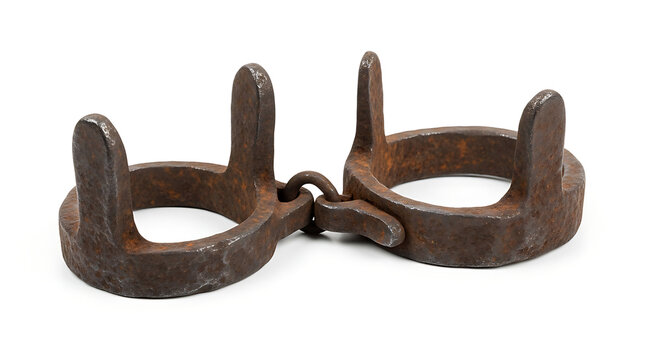 Antique iron leg shackles isolated on white background, historical artifacts