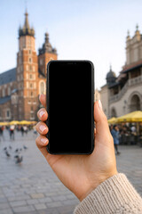 Naklejka premium Photo of someone taking a picture with smartphone