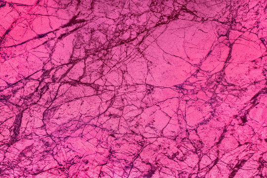 Pink soft color marble surface cracks kitchen interior structure abstract cracked pattern texture floor tile background