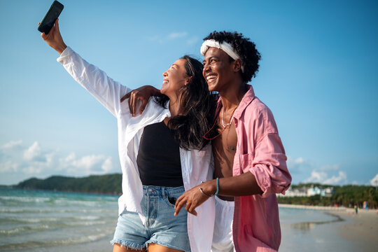 Couple enjoying their tropical vacation with peace of mind, secured by reliable travel insurance