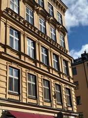 Fototapeta premium Classical European Apartment Building Facade in Golden Sunlight