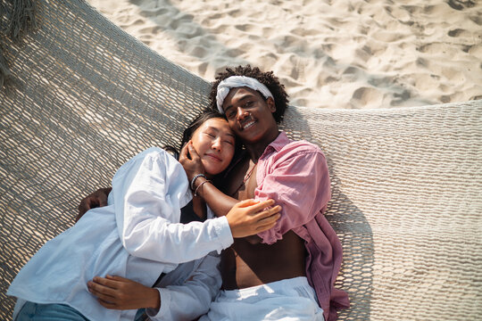 Couple enjoying their tropical vacation with peace of mind, secured by reliable travel insurance