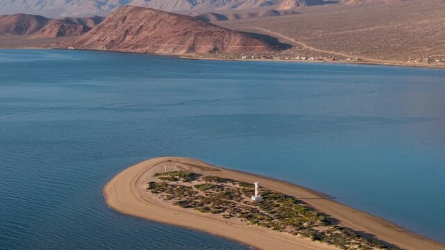 Enjoy aerial views of Bahia De Los Angeles at sunrise with beautiful beach and water showing features of Baja California Mexico