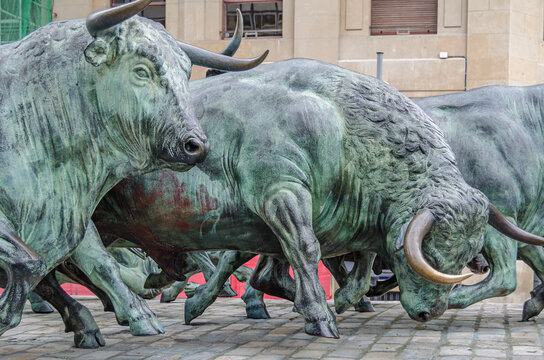PAMPLONA, SPAIN - MAY 3, 2015: Monumento al Encierro (Monument to the Bull Run), the commemorative sculpture by Rafael Huerta honoring the San Fermin bull run, in Pamplona, Navarra, Spain