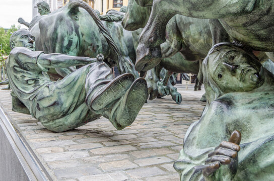PAMPLONA, SPAIN - MAY 3, 2015: Monumento al Encierro (Monument to the Bull Run), the commemorative sculpture by Rafael Huerta honoring the San Fermin bull run, in Pamplona, Navarra, Spain