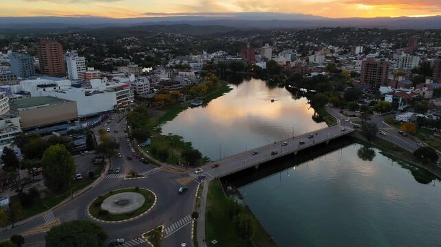 Aerial view of villa carlos paz cityscape at sunset