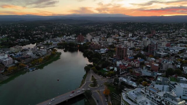 Aerial view of villa carlos paz cityscape at sunset