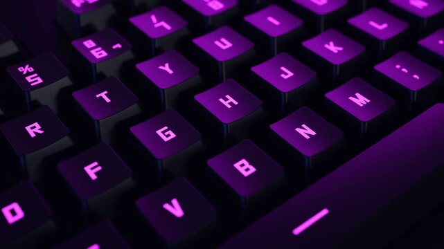 Close-up of a moving backlit mechanical gaming keyboard.
