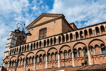 Fototapeta premium Architectural fragments of Saint George the Martyr Cathedral (Basilica Cattedrale di San Giorgio Martire) in Romanesque style was built in 1135. Ferrara, Emilia-Romagna, Italy.