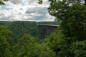 Fototapeta premium Traffic Crossing The New River Gorge Bridge In The West Virginia Park