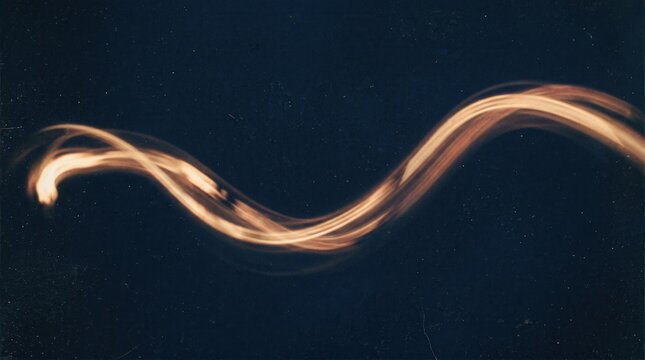 Golden light trail wave moving across dark night sky perfect for presentation, website background, and cinematic branding