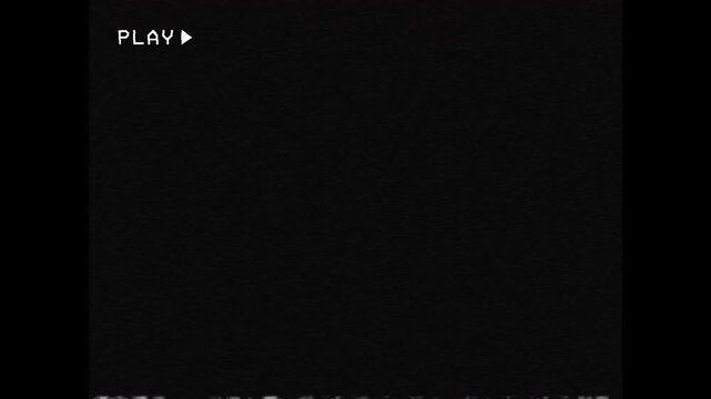 VHS tape playing with colorful analog distortion, fuzzy TV static and scanlines, including a retro minimalist play indicator. Aesthetic vintage background for creative edits. Seamless loop. 3x4.