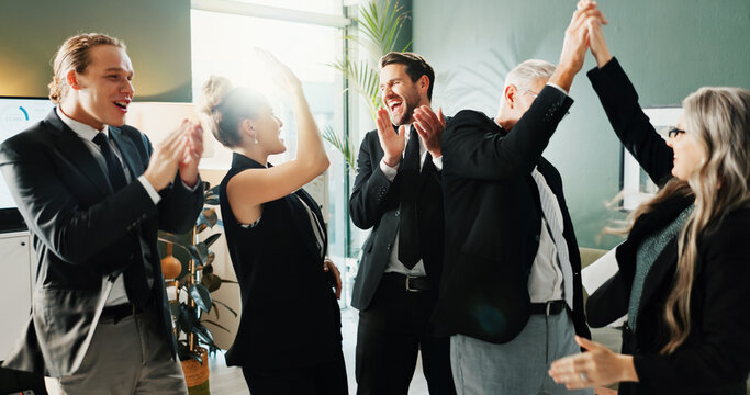 Happy, high five or team in office with good news, celebration or approval of investment pitch. Collaboration, people or finance advisor with success, revenue growth or victory in funding opportunity