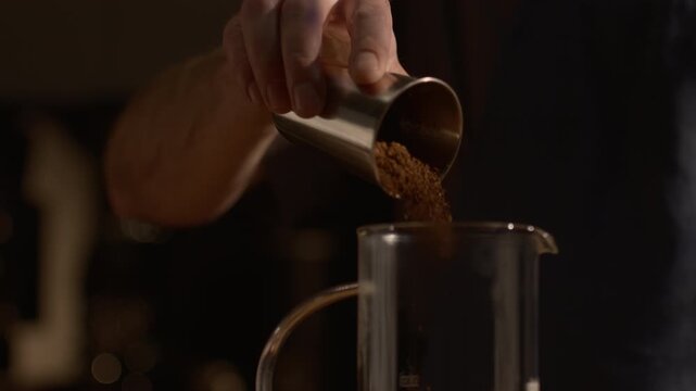 Barista Hand Adding Ground Coffee into V60 Filter, Pour Over Preparation, Close-Up, Specialty Coffee Brewing Process