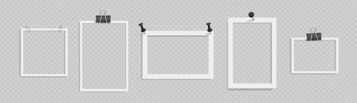 Creative collection of empty picture frames with binder clips attached for organization and display purposes