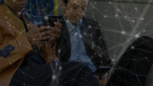 Suited man and tan-jacket woman tapping phones during commute causing network response over nodes