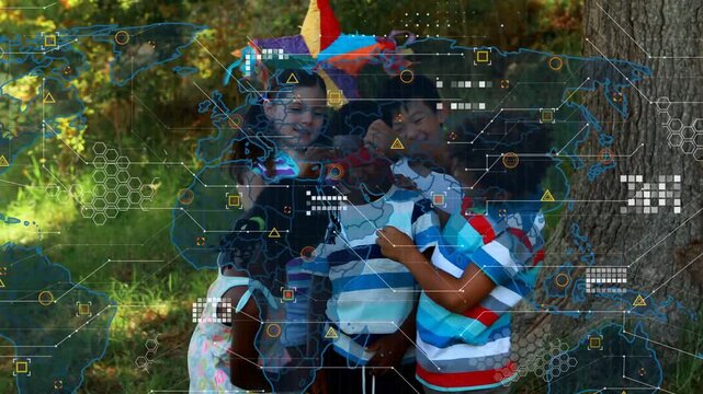 Vertical video: Gathering 5 kids tying blindfold on center kid preparing to hit pinata in park, map