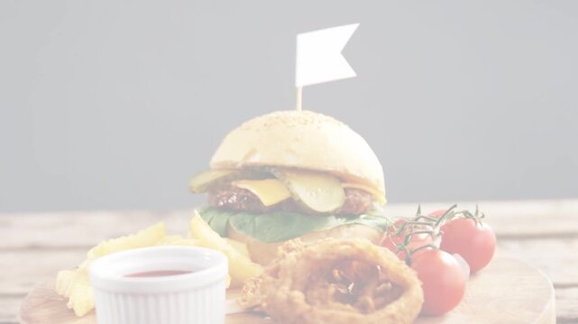 Soft focus lifting, camera panning, burger centering with sauce cup and fries, showcasing burger
