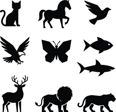 Set of black animal silhouettes including cat horse bird eagle butterfly fish shark deer lion and tiger icons