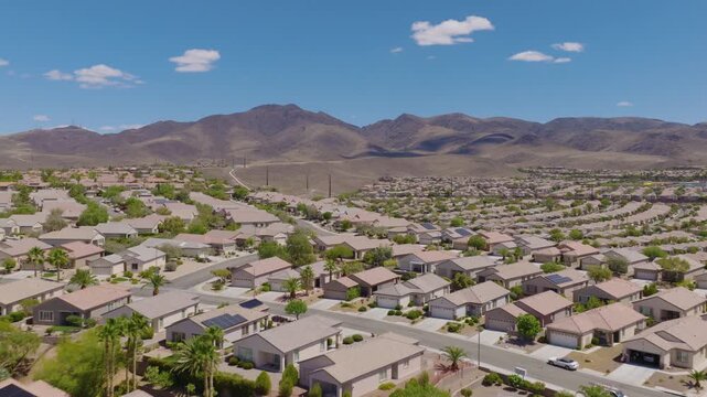 Aerial Moving Shot of Henderson Suburban Homes Near Desert Mountains
