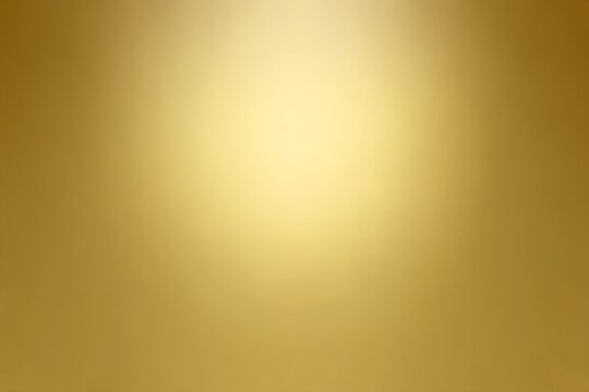 Gold brass metal gradient texture with soft center spotlight lighting.