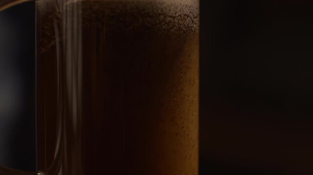 French press coffee brewing, hot water infusion and stirring, rich texture, dark cinematic atmosphere with natural light rays.